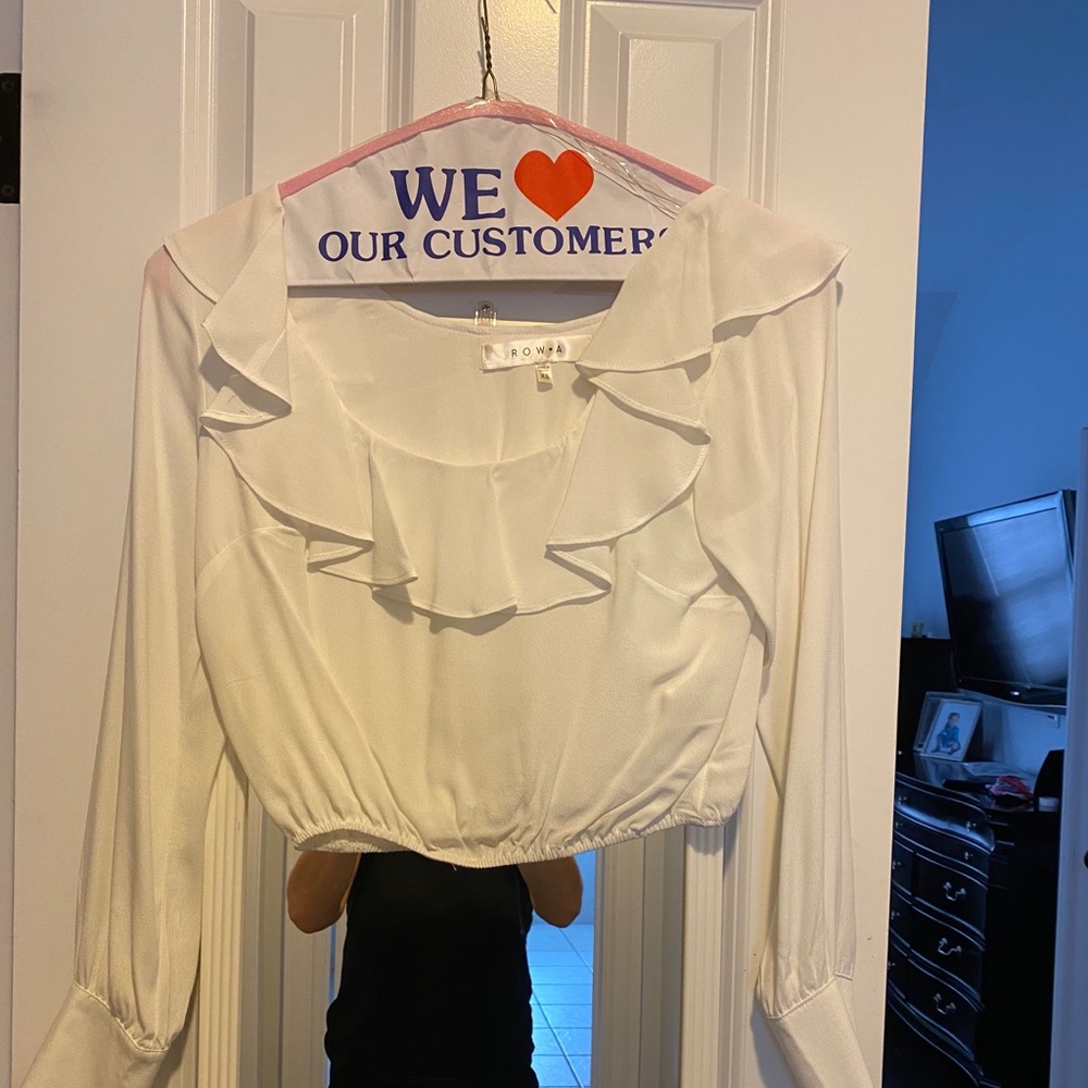 White ruffle blouse